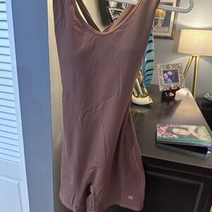 SO   Brown one piece workout bodysuit with Crisscross straps